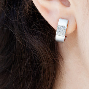 18KT WHITE GOLD EARRINGS WITH BRUSHED FINISH AND PAVE DIAMONDS. THESE ARE MODERN CLIP ON EARRINGS! 