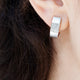18KT WHITE GOLD EARRINGS WITH BRUSHED FINISH AND PAVE DIAMONDS. THESE ARE MODERN CLIP ON EARRINGS! 
