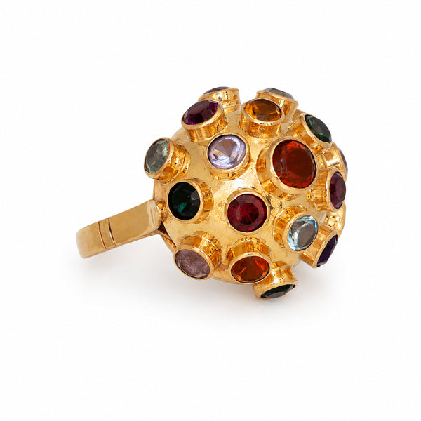 Side view of mid-century 18K yellow gold Technicolor Sputnik ring with bezel-set gemstones