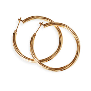 18kt yellow gold hoops with ribbing