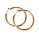 18kt yellow gold hoops with ribbing