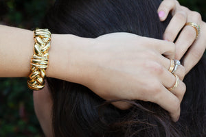  This 18kt yellow gold heavy braided cuff bracelet is so well made and flexible!