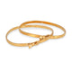 Pair of Angela Cummings Bow Bangles from 1984