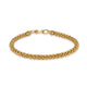 Gold beaded bracelet on a white background