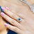 Edwardian sapphire and old mine cut diamond ring on hand, 18kt yellow gold, signed Reiman