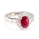 Angled side view of Burmese ruby ring in platinum with baguette and round diamonds