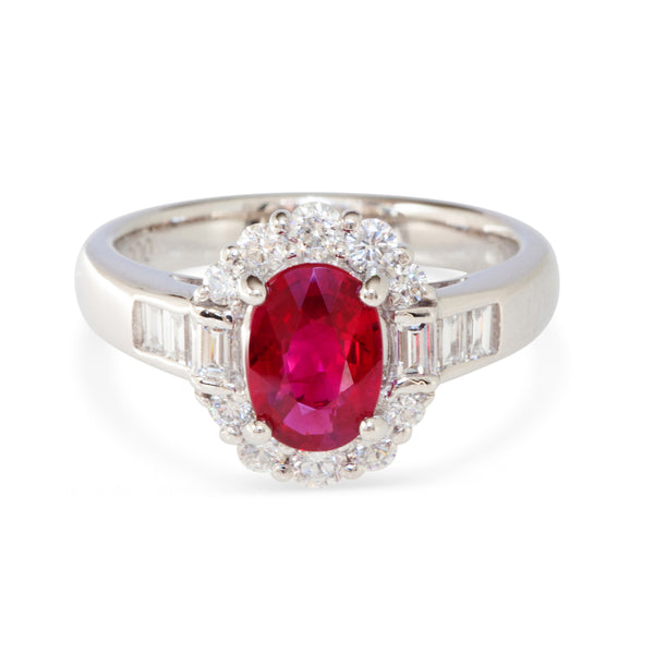 Front view of platinum ring with vivid red Burmese ruby and split halo of diamonds