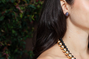Model wearing vintage Tiffany Schlumberger enamel earrings