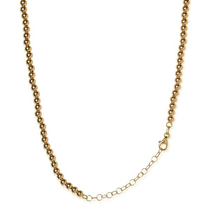 Close-up of the adjustable clasp and extender of the 14kt gold beaded necklace