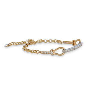 Angled view of 14KT yellow gold link bracelet with pavé diamond bar