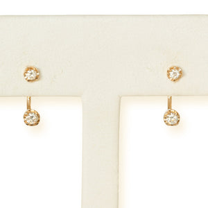 14kt-yellow-gold-double-diamond-earrings-front.jpg → Front view of 14kt yellow gold double diamond earrings on display card