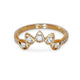 Close-up of 14KT yellow gold curved ring with pear-shaped bezel diamonds