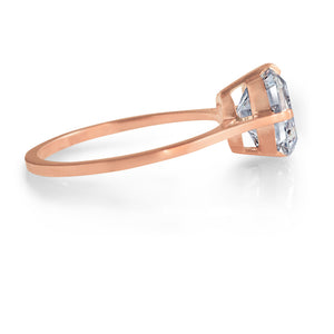 Side view of Asscher cut diamond ring in 18kt rose gold solitaire setting