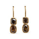 Front view of 18kt yellow gold two-stone brown diamond earrings