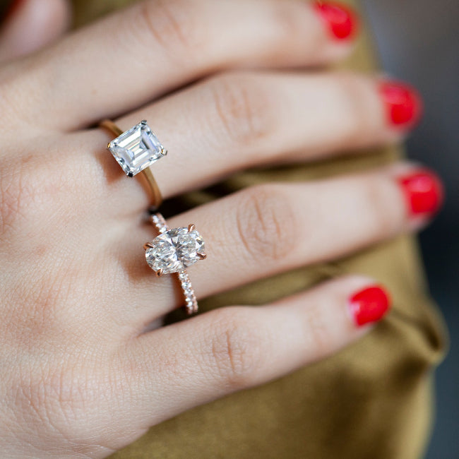 3.01ct oval diamond ring shown stacked on hand